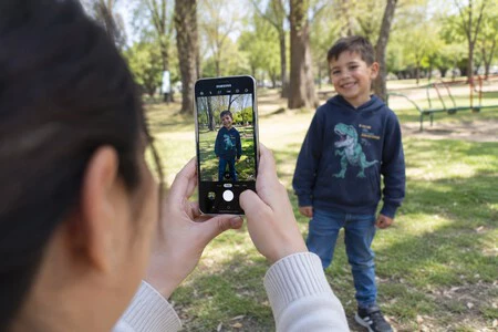 Haciendo Una Foto A Un Nino